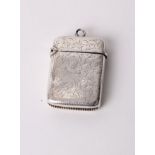 A sterling silver vesta case with scrolling acanthus leaf decoration, by Joseph Gloster (date