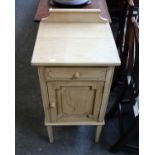 A Victorian stripped pine pot cupboard on square tapering supports