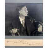 Black and white three quarter photograph of John Cowper Powys, signed and inscribed Affectionately