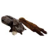 Two mid 20th century fur stoles complete with head and feet.