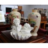 A pair of Oriental style vases together with a white porcelain bowl topped by putto.