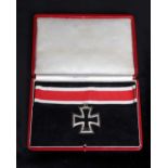 Militaria. A World War II, replica Iron Cross and Ribbon, in red leather presentation box,
