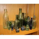 A collection of 19th/20th century coloured bottles and glass to include, ink bottles, cod bottles
