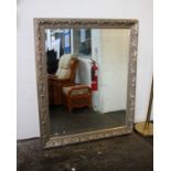 A large wall mirror with gilt frame in the Art Nouveau style. 108cm x 136cm