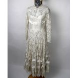 Original 1950's Sylvia Ann bridal dress, petit in size, full length lace. Tag attached