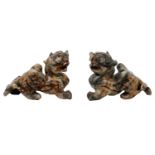 A pair of Oriental carved Jade Lions.