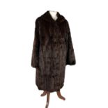 A vintage knee length Canadian mink fur coat.