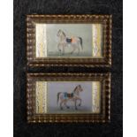 A pair of Indian miniature paintings in the Mughal style, each depicting a horse, measuring 9 x 16cm
