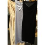 Mixed 20th century ladies clothing to include a floral silver and gold long dress, a velvet skirt,