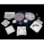 A collection of 19th/20th century linens to include centrepieces, table runners and cloths