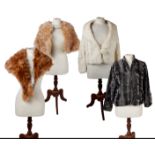 Ten various vintage fur shrugs, a black muff and and feather jackets, together with some fur stoles