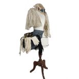 An 18th century hip pannier, together with a child's bonnet plus ladies kid leather opera gloves and