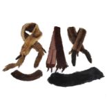 A collection of mid 20th century Mink and fur belts and collars