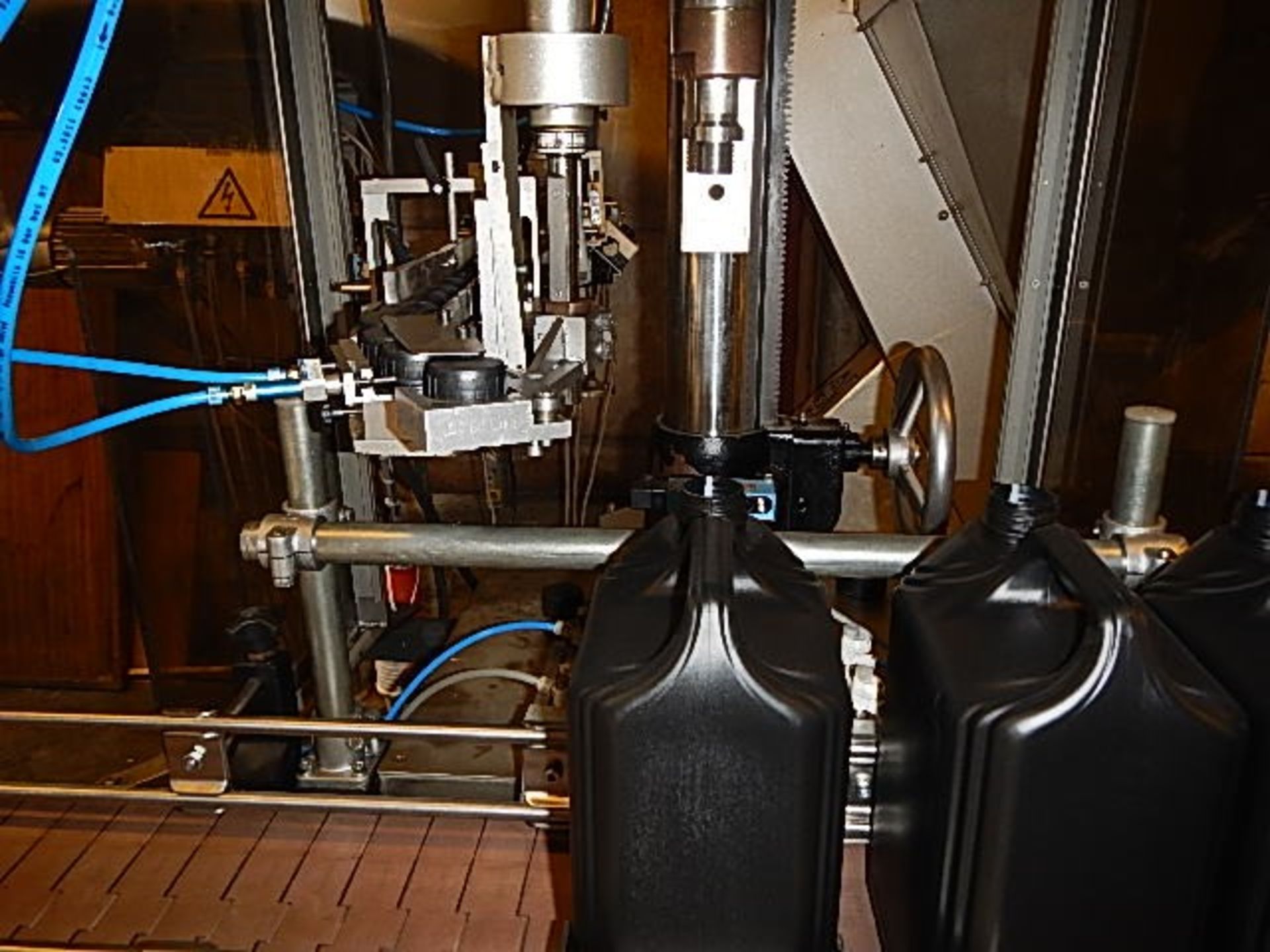 Rationator 6 head 5 litre filling line comprising: - Image 13 of 16