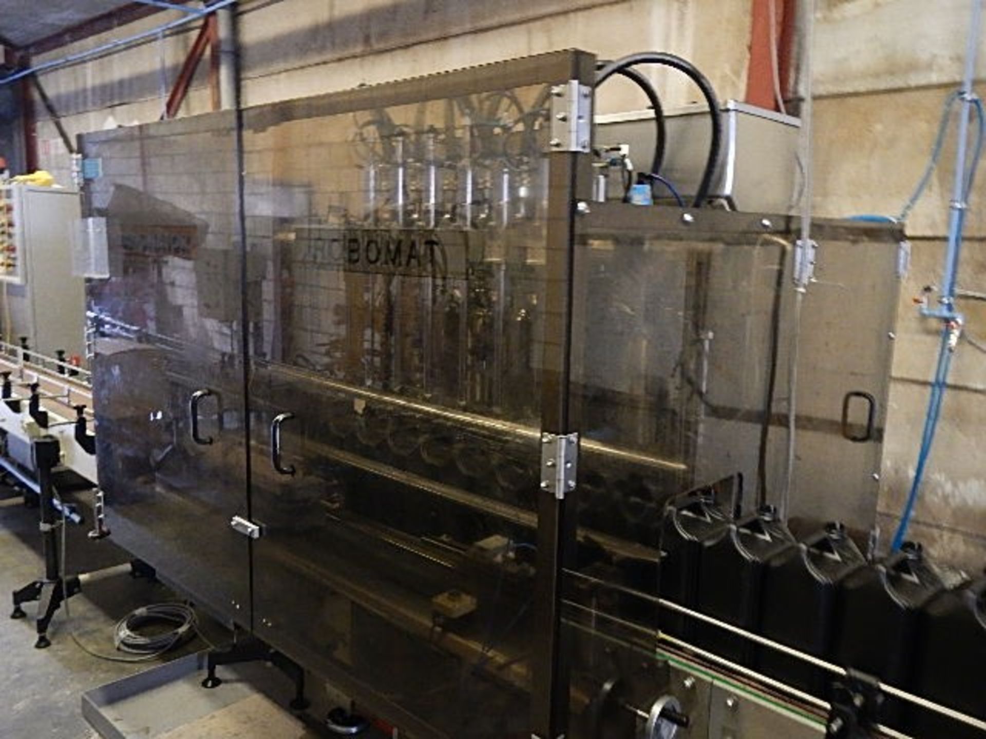 Rationator 6 head 5 litre filling line comprising: - Bild 2 aus 16