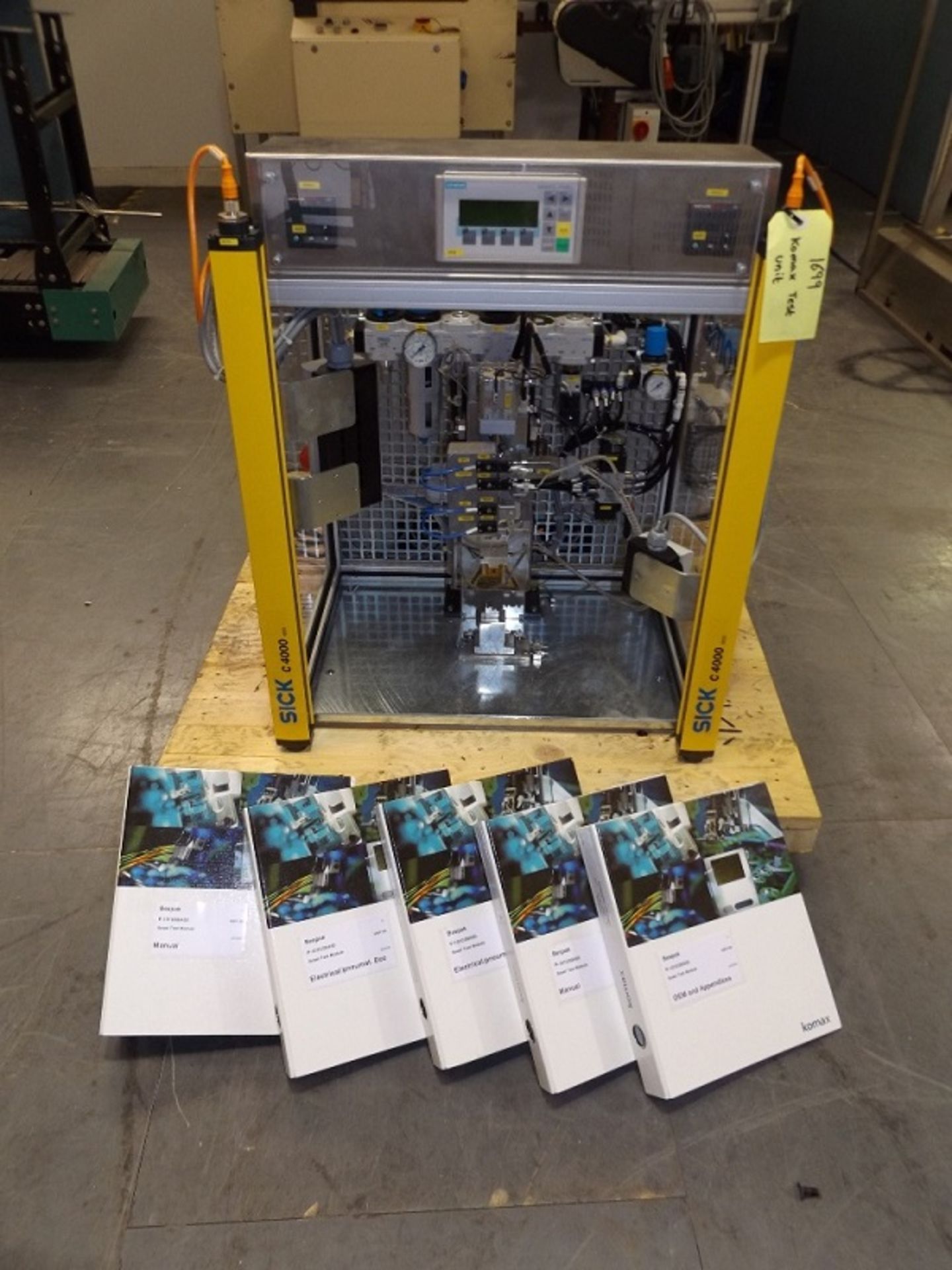 Komax model Sosei test unit for assembly of non-pr