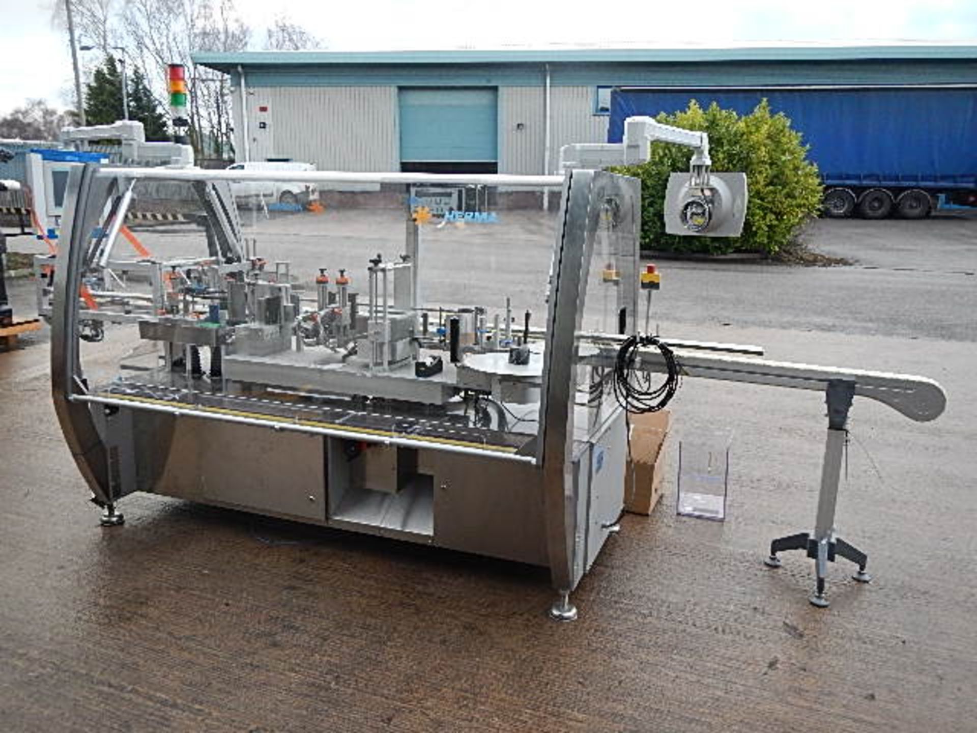 Herma 132 M series high speed wrap around labeller