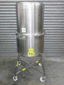 Pharmatech stainless steel drum on mobile base. Located in Corby