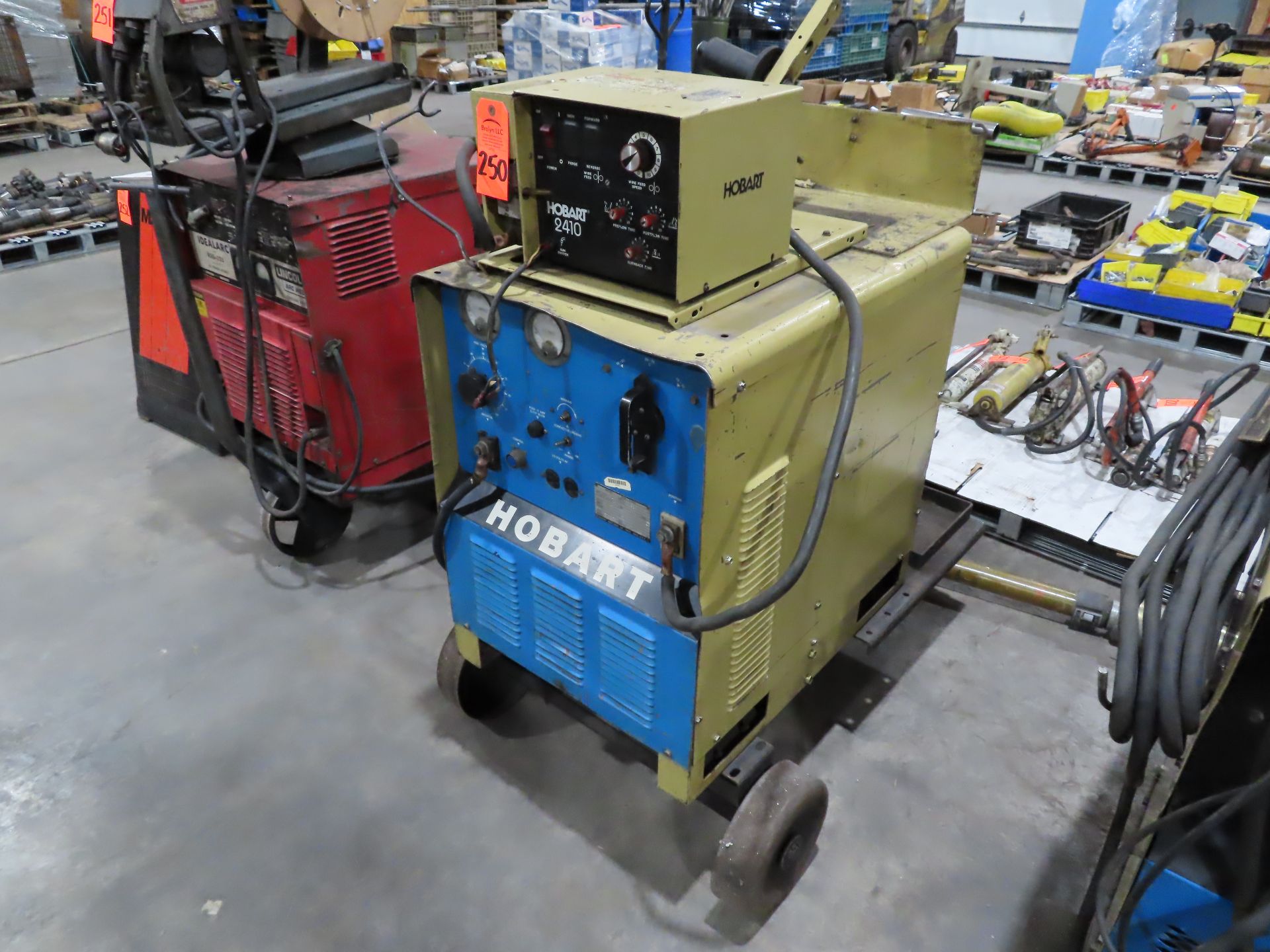 Hobart 300 amp welder with Hobart 2410 feed unit. This item can be picked up onsite with no