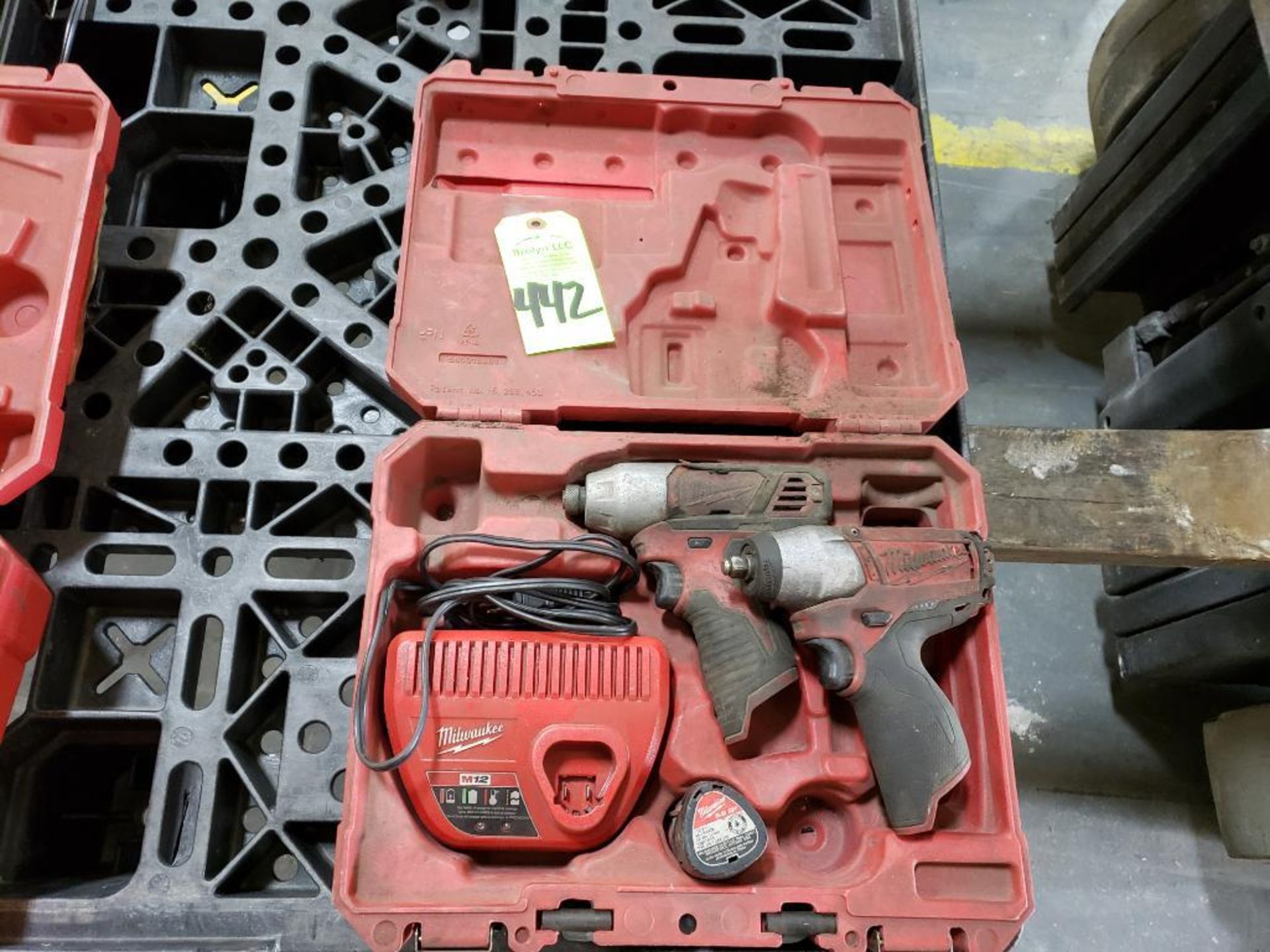 Milwaukee Lithion Ion 2 piece impact/drill driver kit with charger and case. One battery included