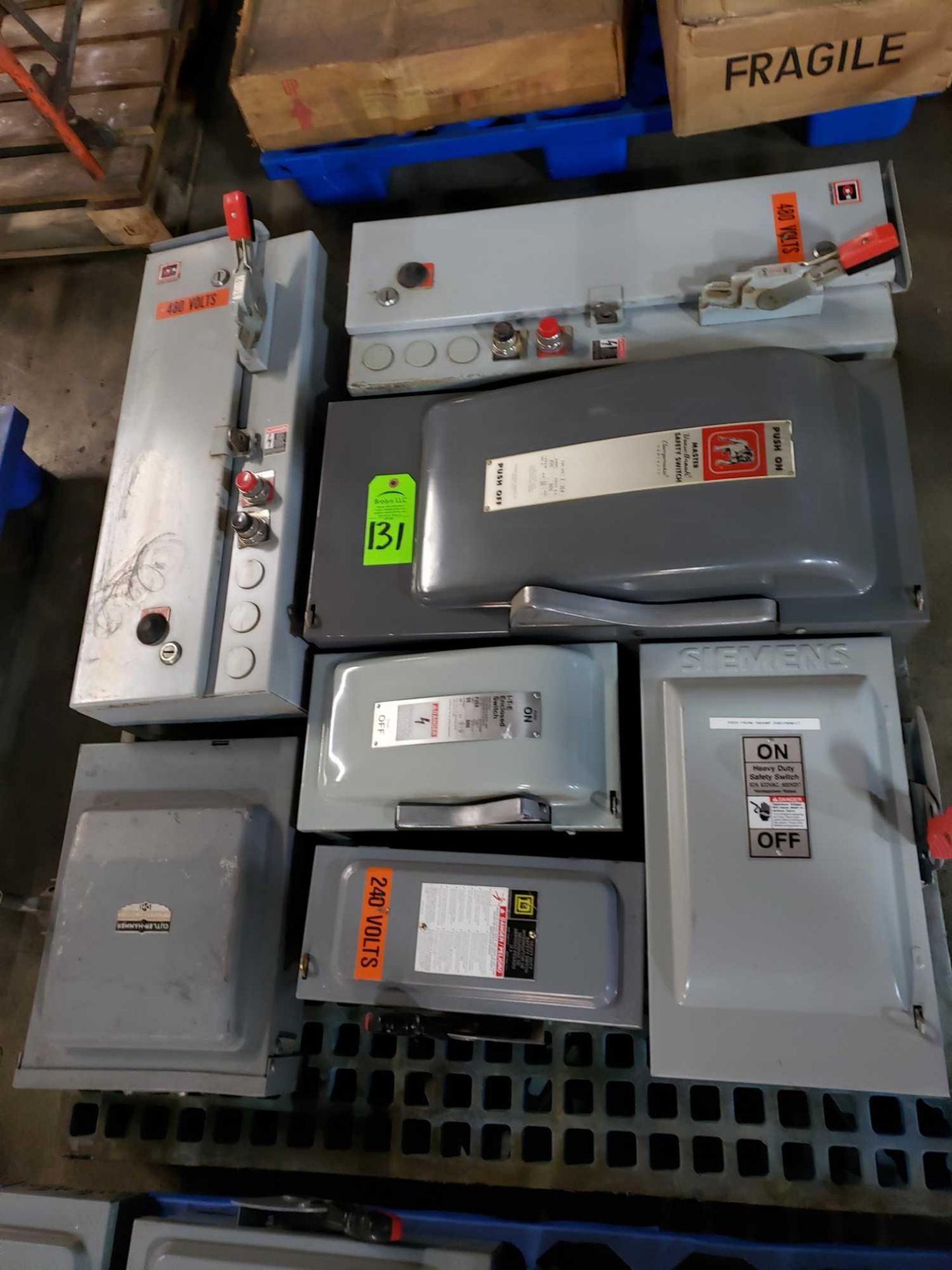 Pallet of assorted disconnects/ starters from Square D, GE, and Eaton Cutler Hammer