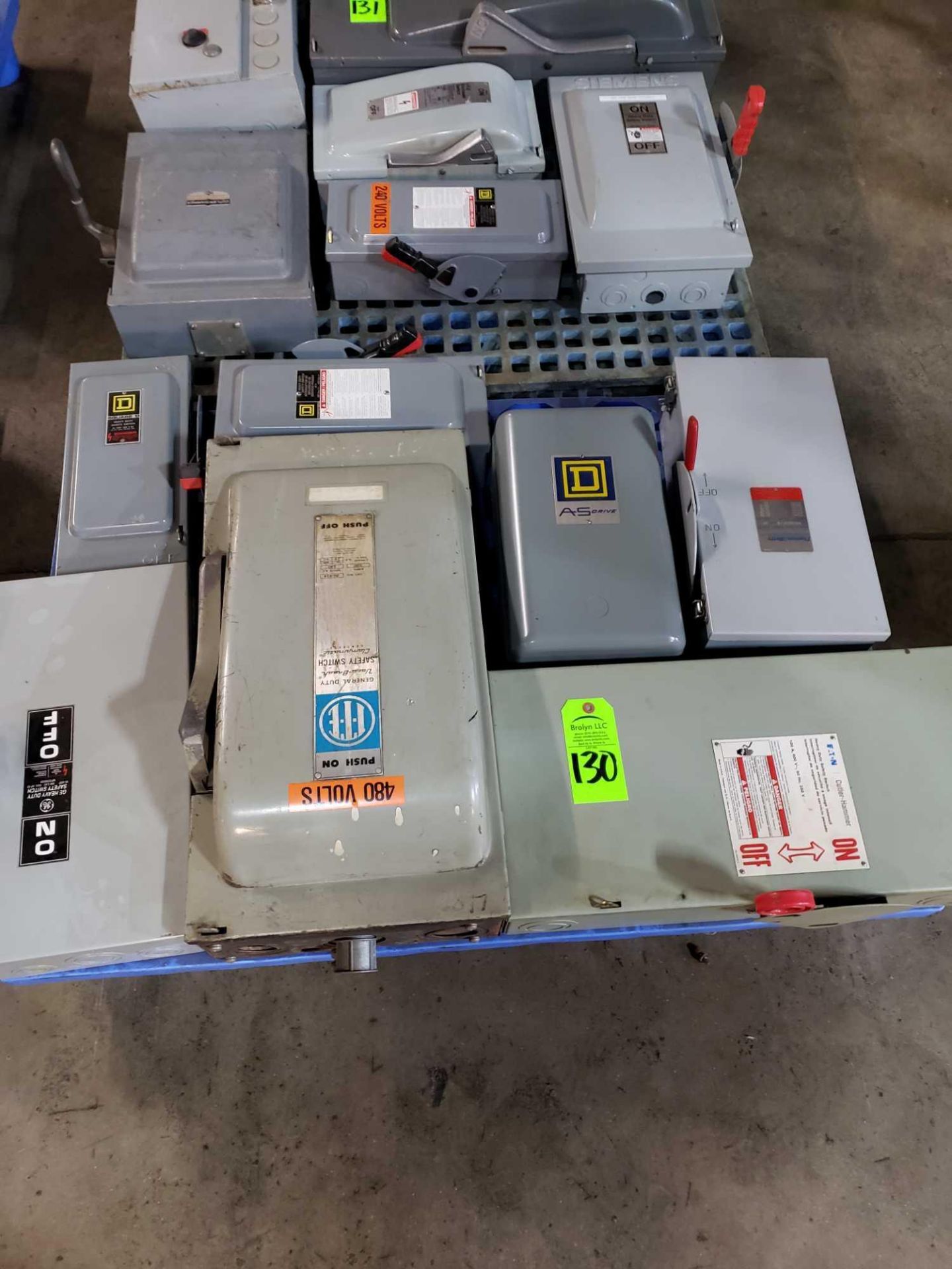 Pallet of assorted disconnects from Square D, GE, and Eaton Cutler Hammer