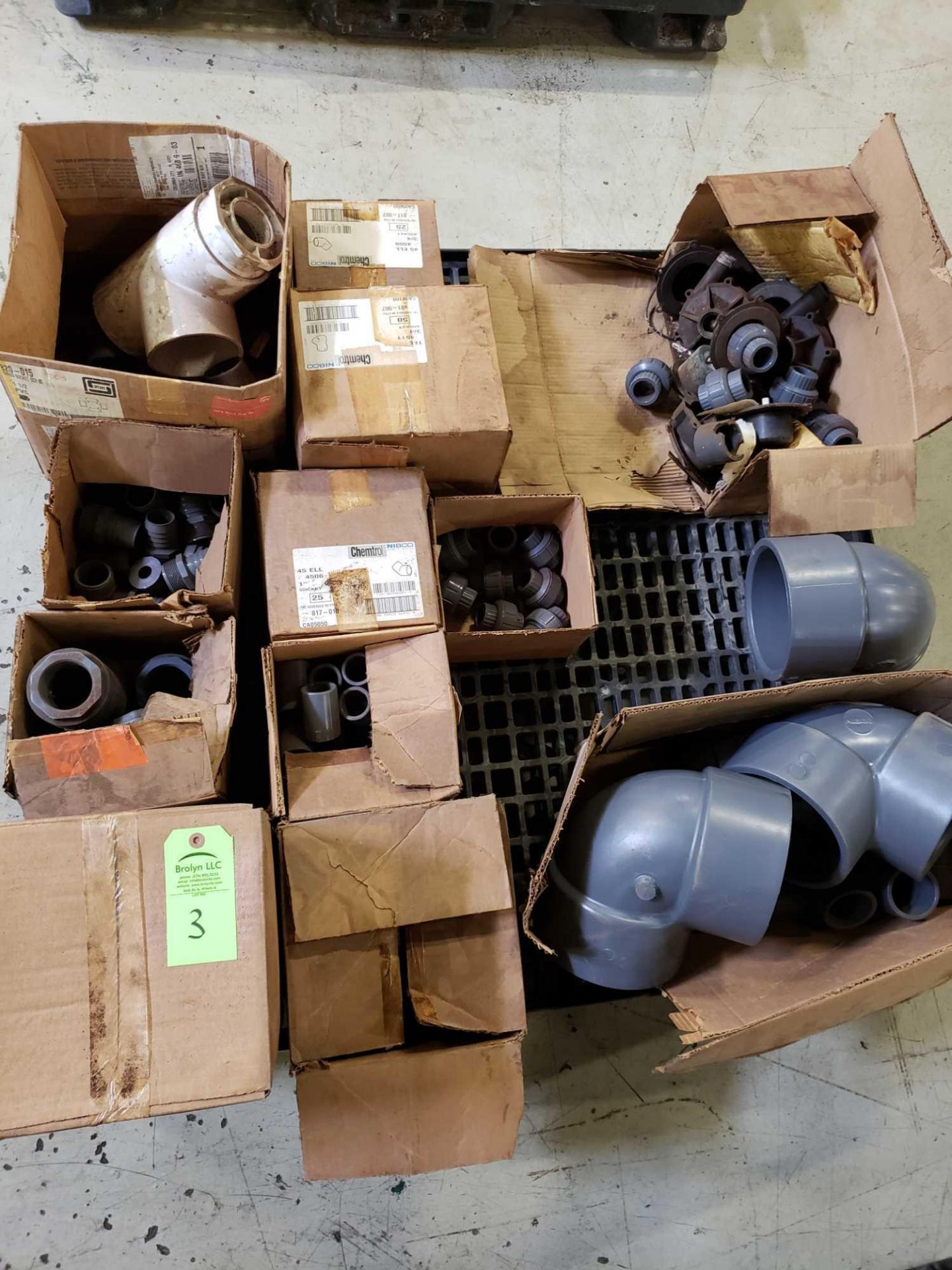Pallet of assorted plumbing components.