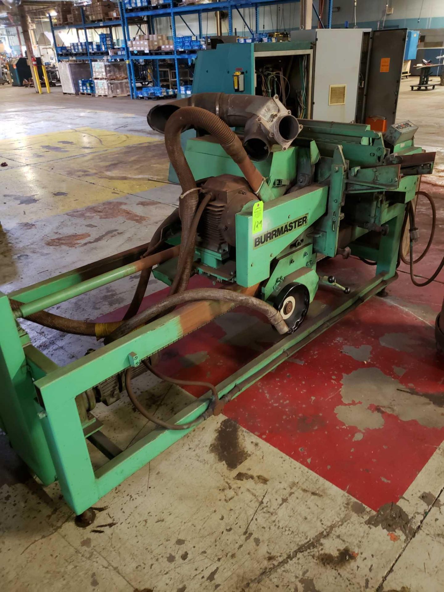 Burrmaster double end tube deburring machine.