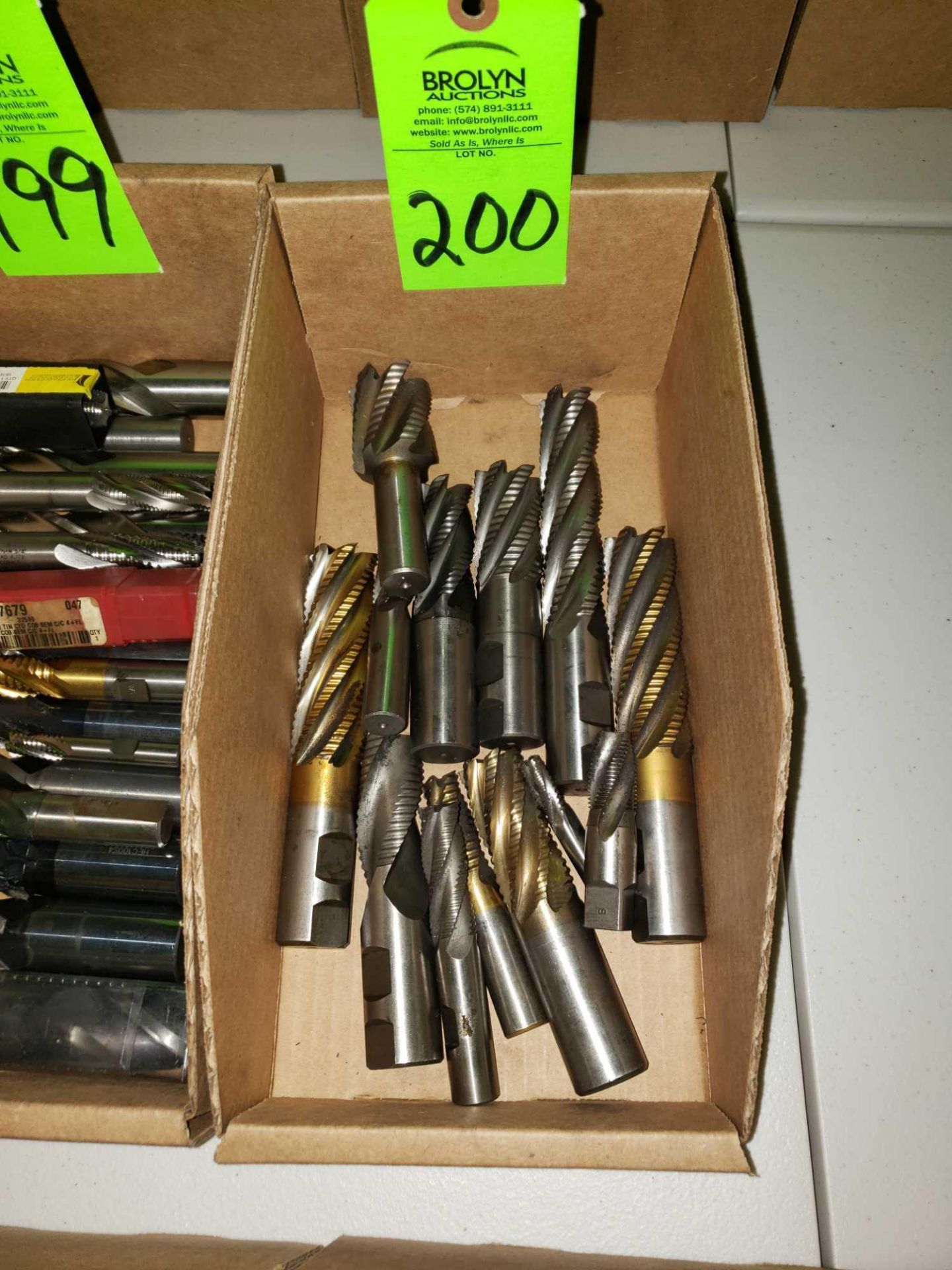 Assorted end mills as pictured.