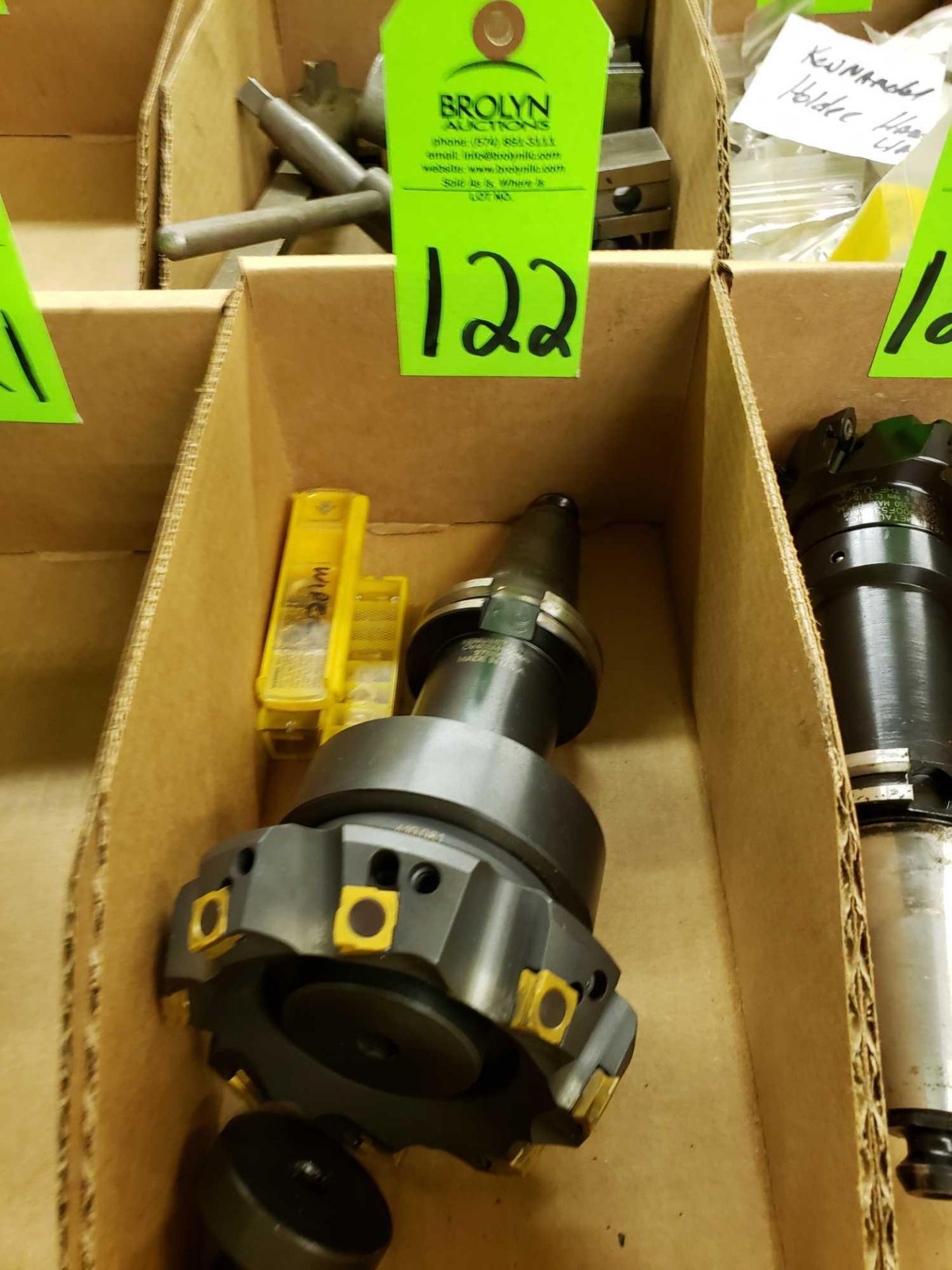 Kennametal Cat 40 tooling with facemill and extra inserts.