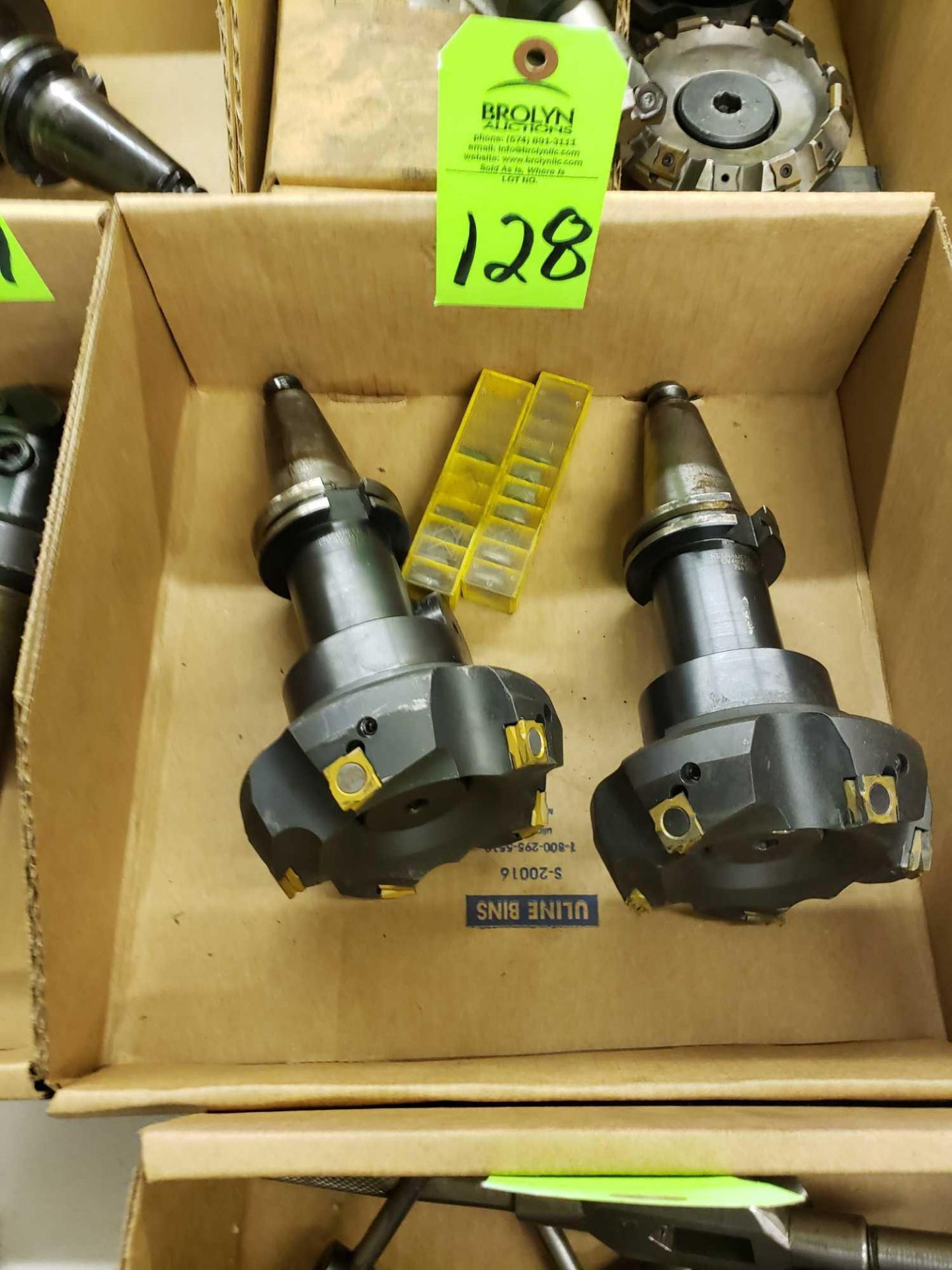 Assorted Cat 40 tooling with facemills and extra inserts as pictured.