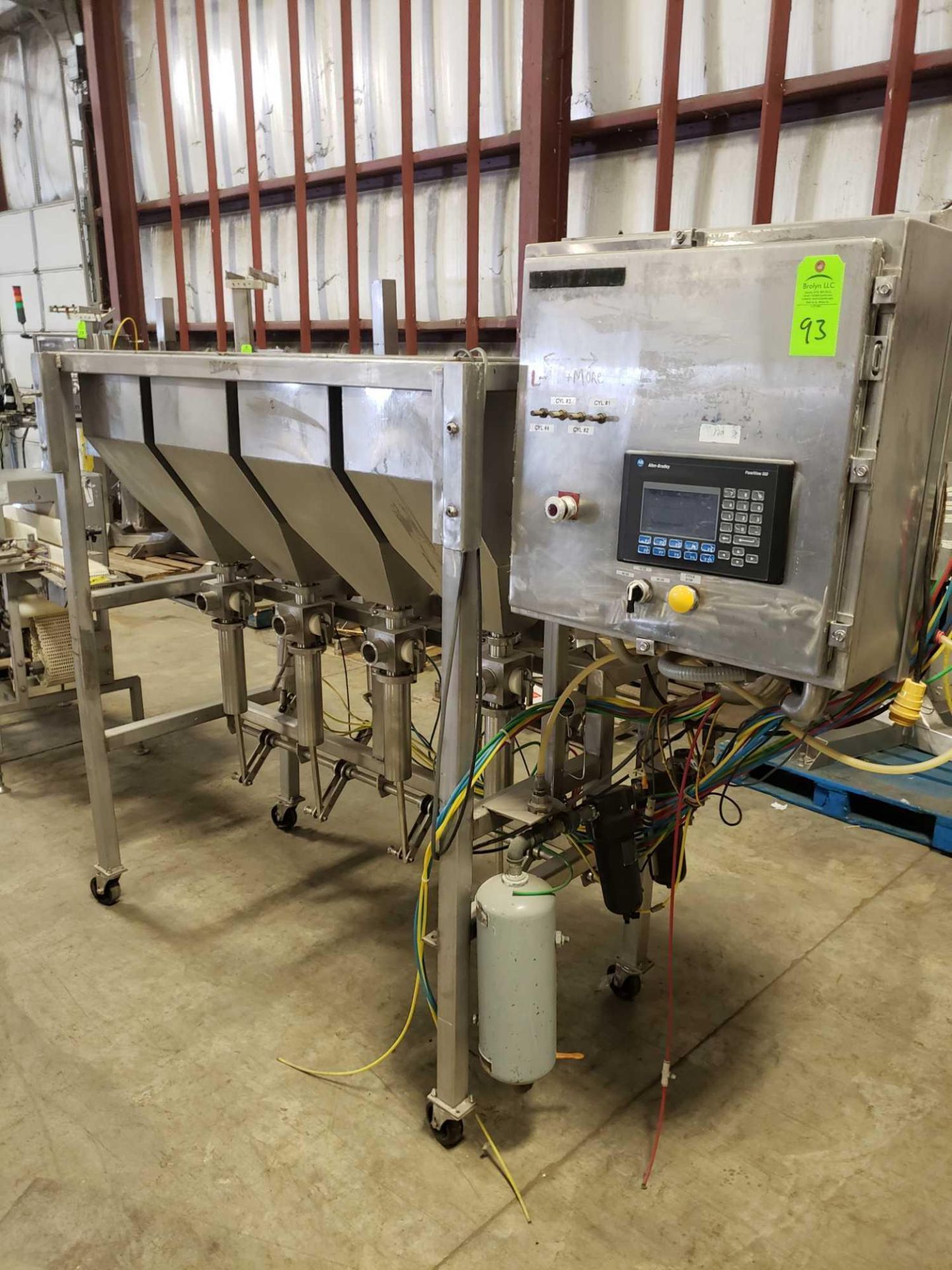 4 hopper stainless filler machine with Allen Bradley PLC.