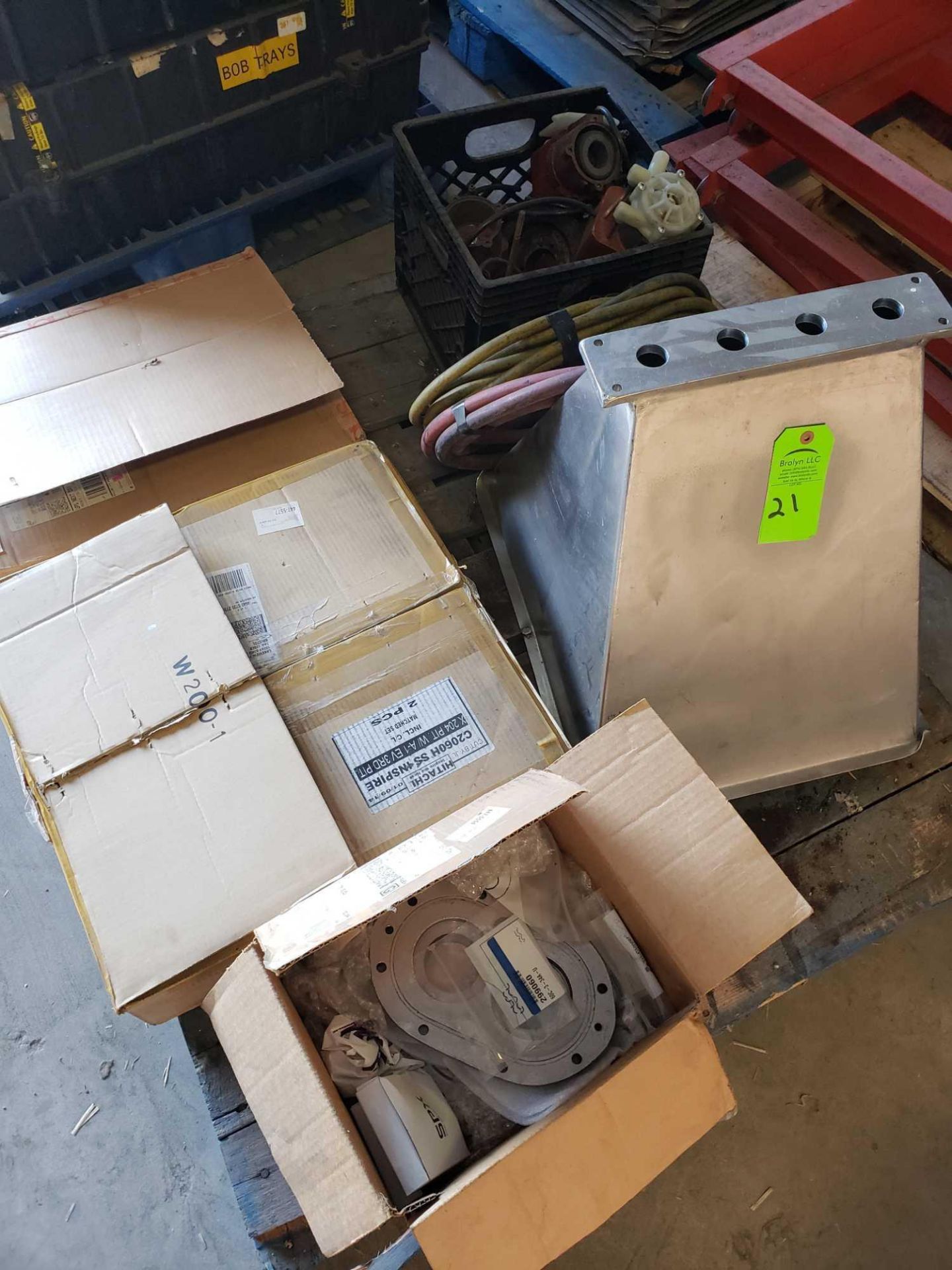 Pallet of assorted parts and components.