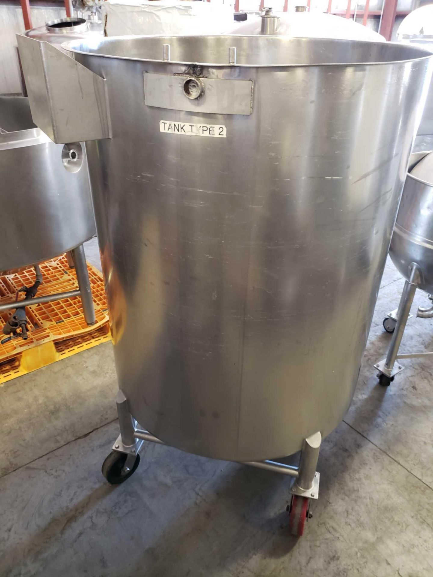 Stainless steel tank on casters. 40" diameter x 48" interior depth with lid inside. Est 250 gallon - Image 3 of 6