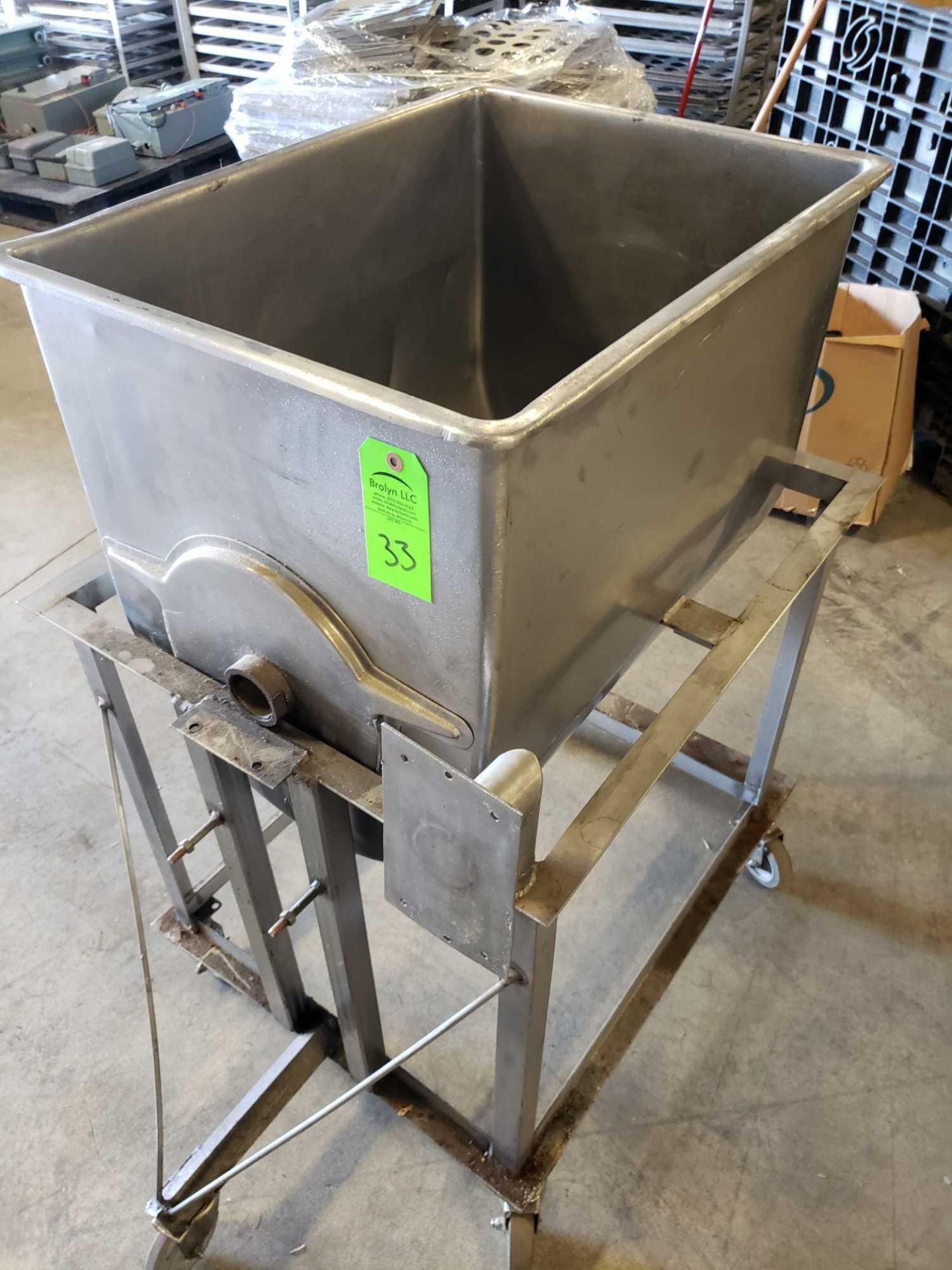 28"long x 21" wide x 23" deep Dumping stainless steal tank/hopper on cart with drain as pictured.