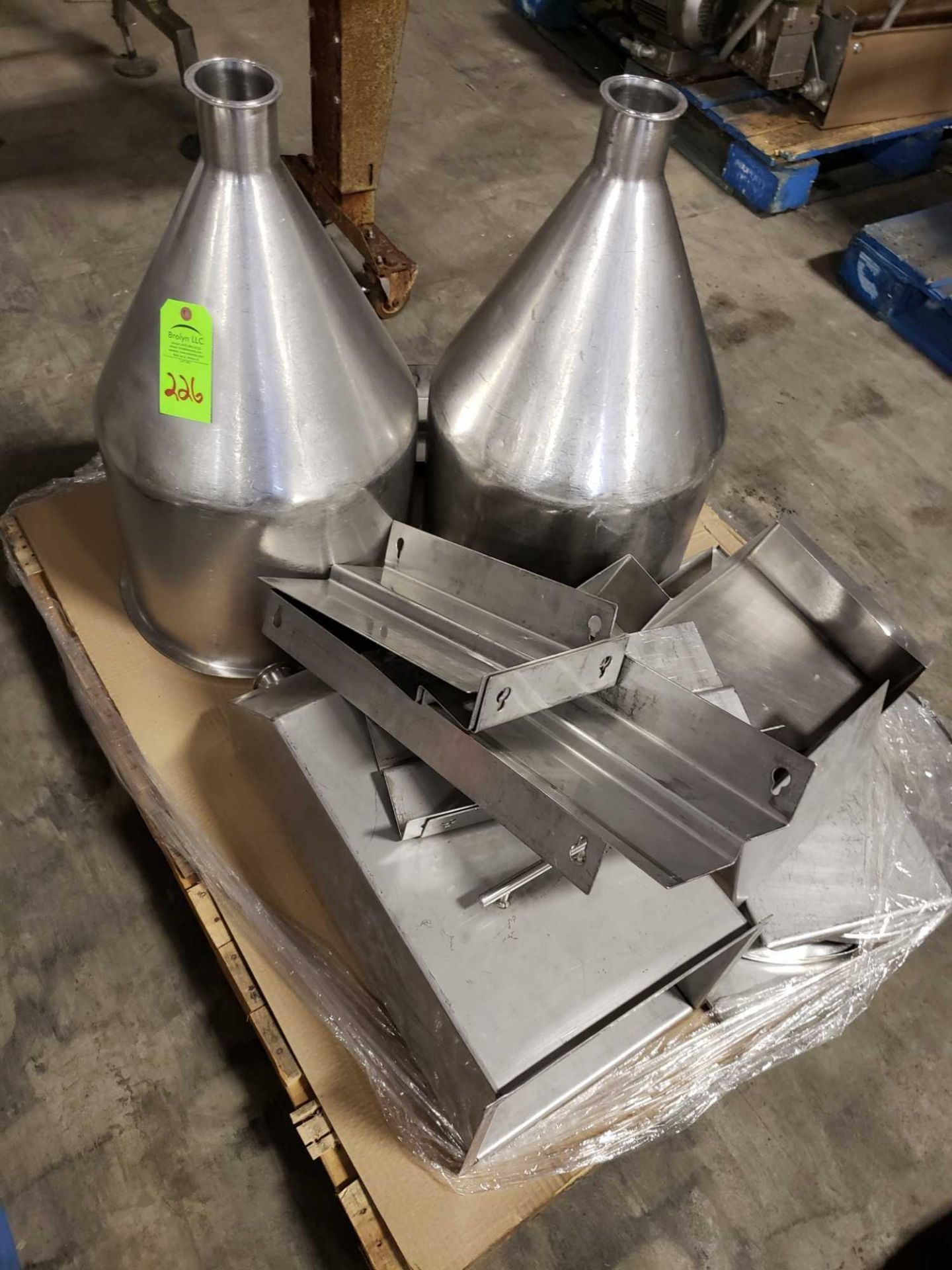 Pallet of assorted stainless steel components.