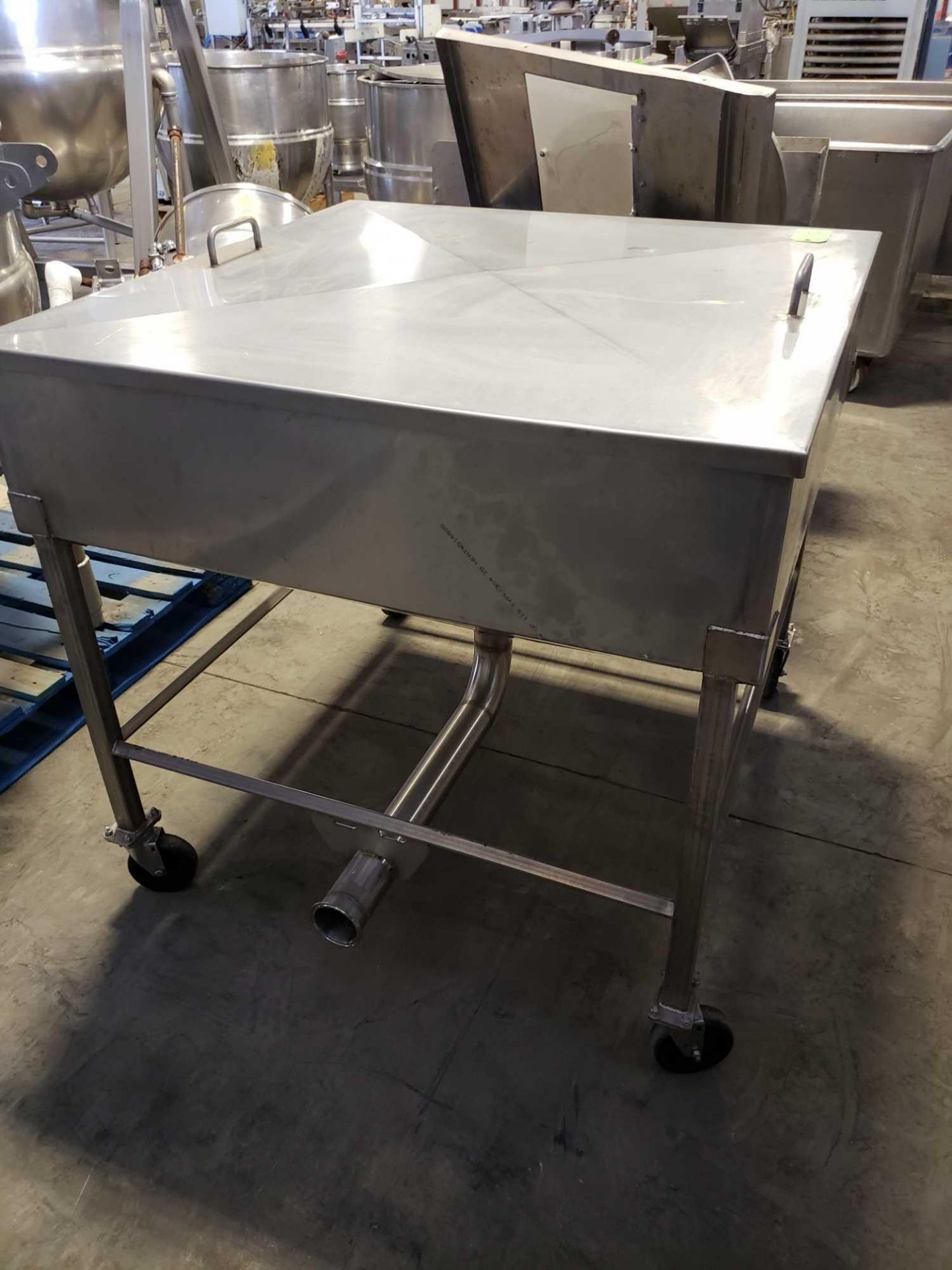 Stainless steel hopper, approx 44" wide x 44" long x 12" deep on casters with center feed drain - Image 3 of 5