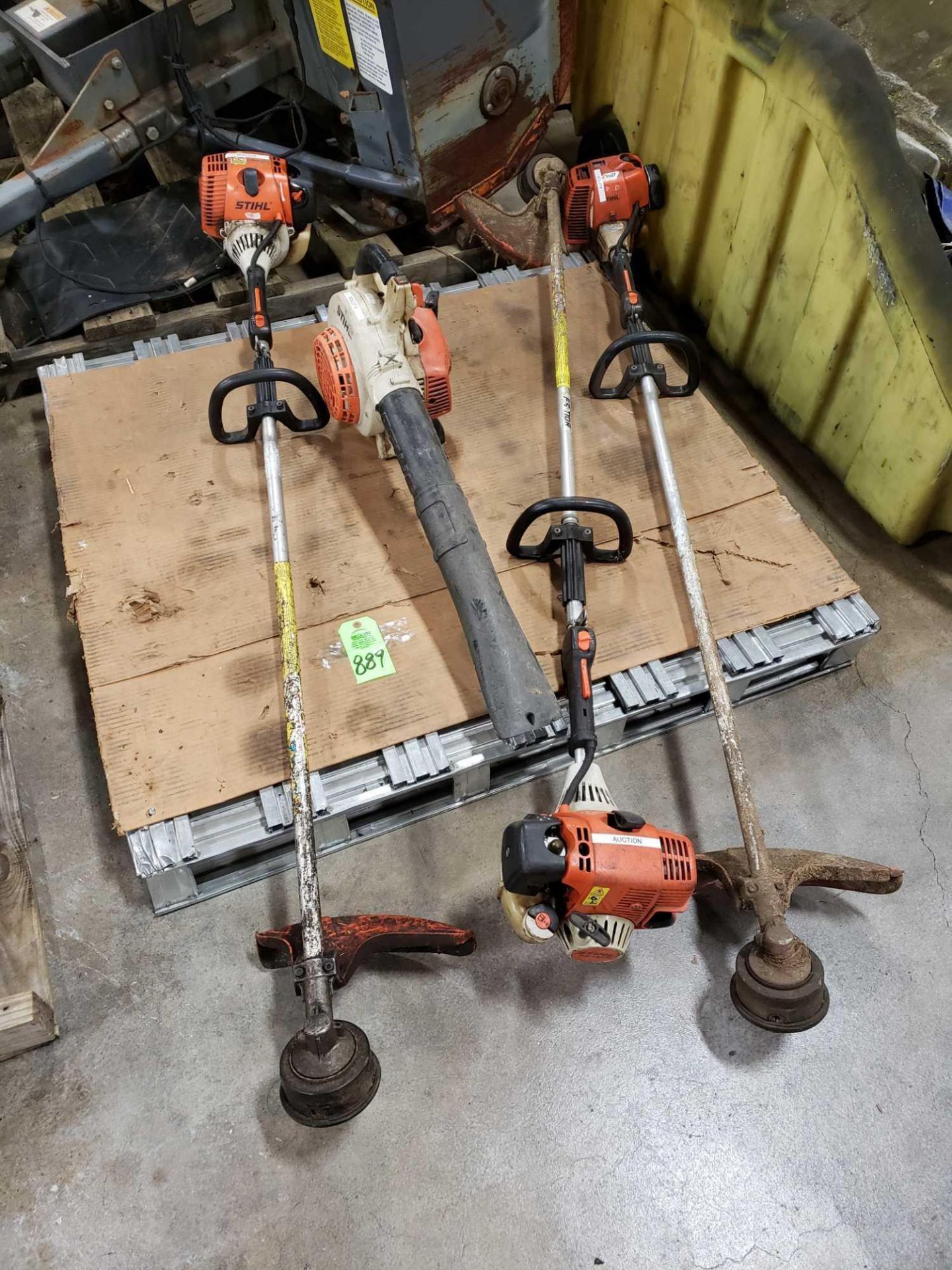Assortment of Stihl trimmers and blower. Most will need carb work.