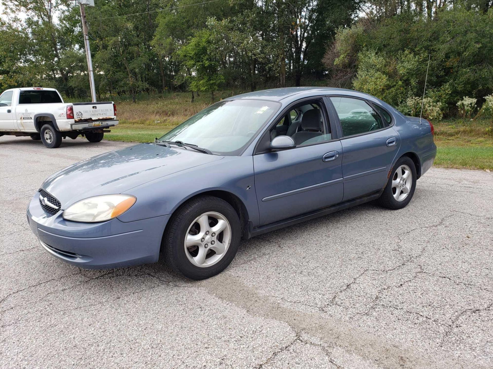 2001 Ford Taurus VIN 1FAFP53291G230229, 70,126 miles. Municipally owned and maintained.