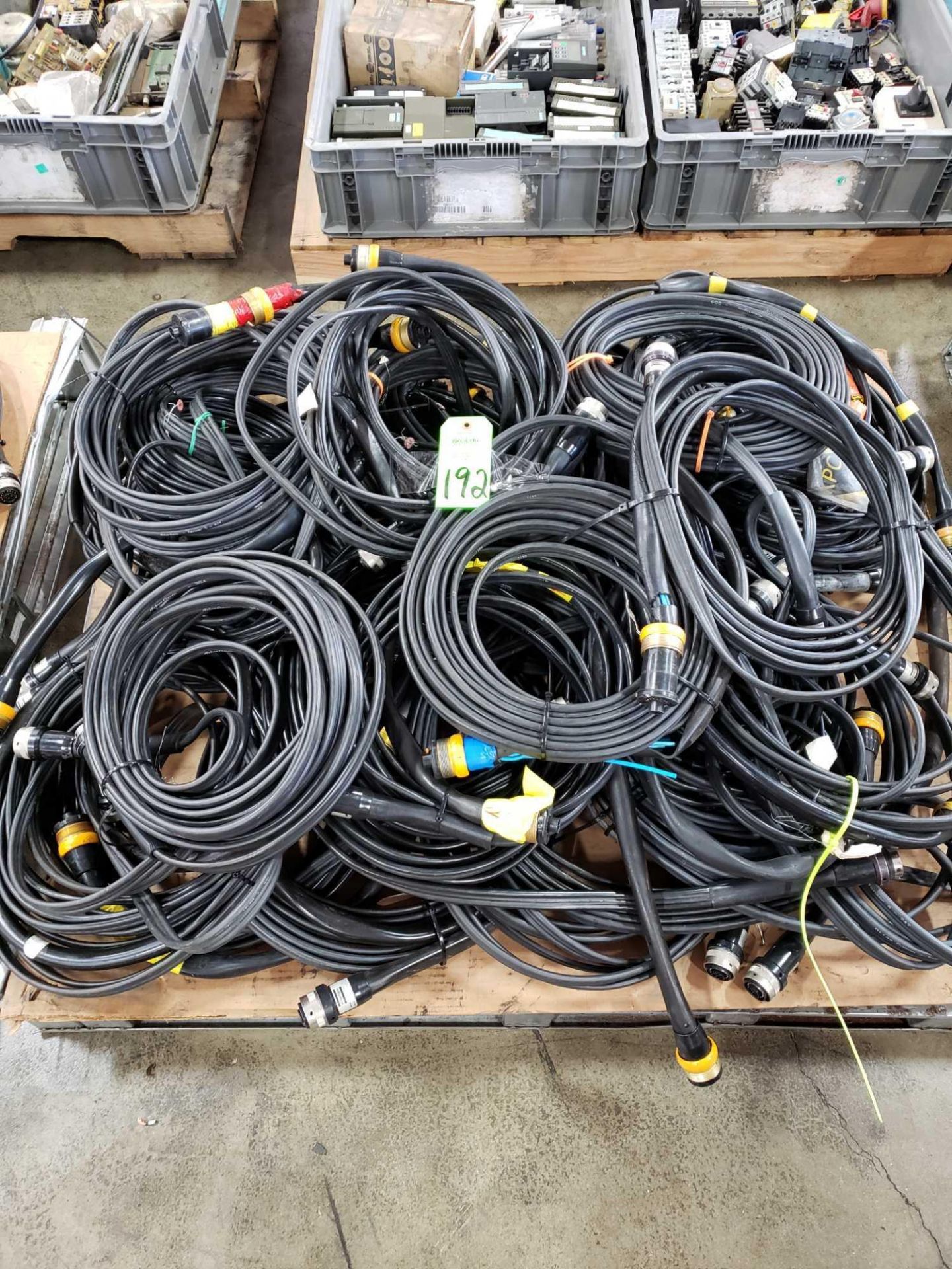 Pallet large assortment of Atlas Copco interface cables.