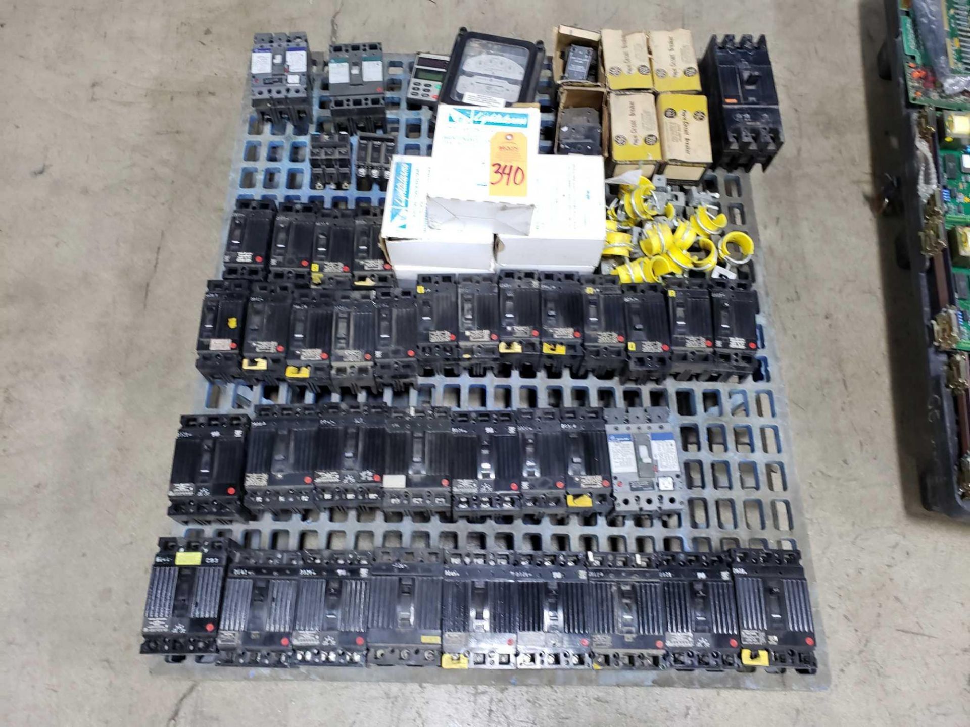 Pallet of assorted molded case breakers.
