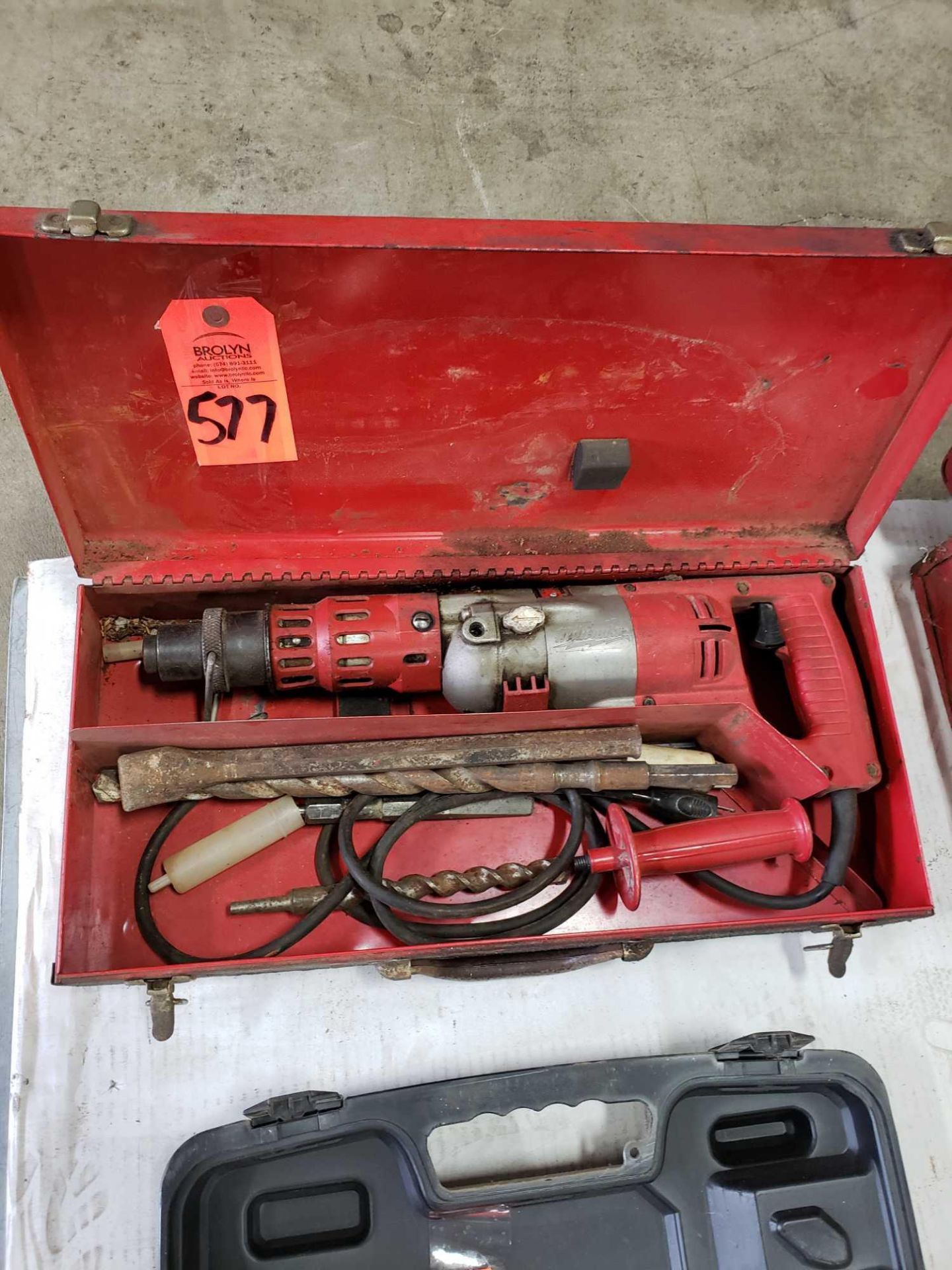 Milwaukee rotary hammer drill model 5351 single phase 110v with case and bits.