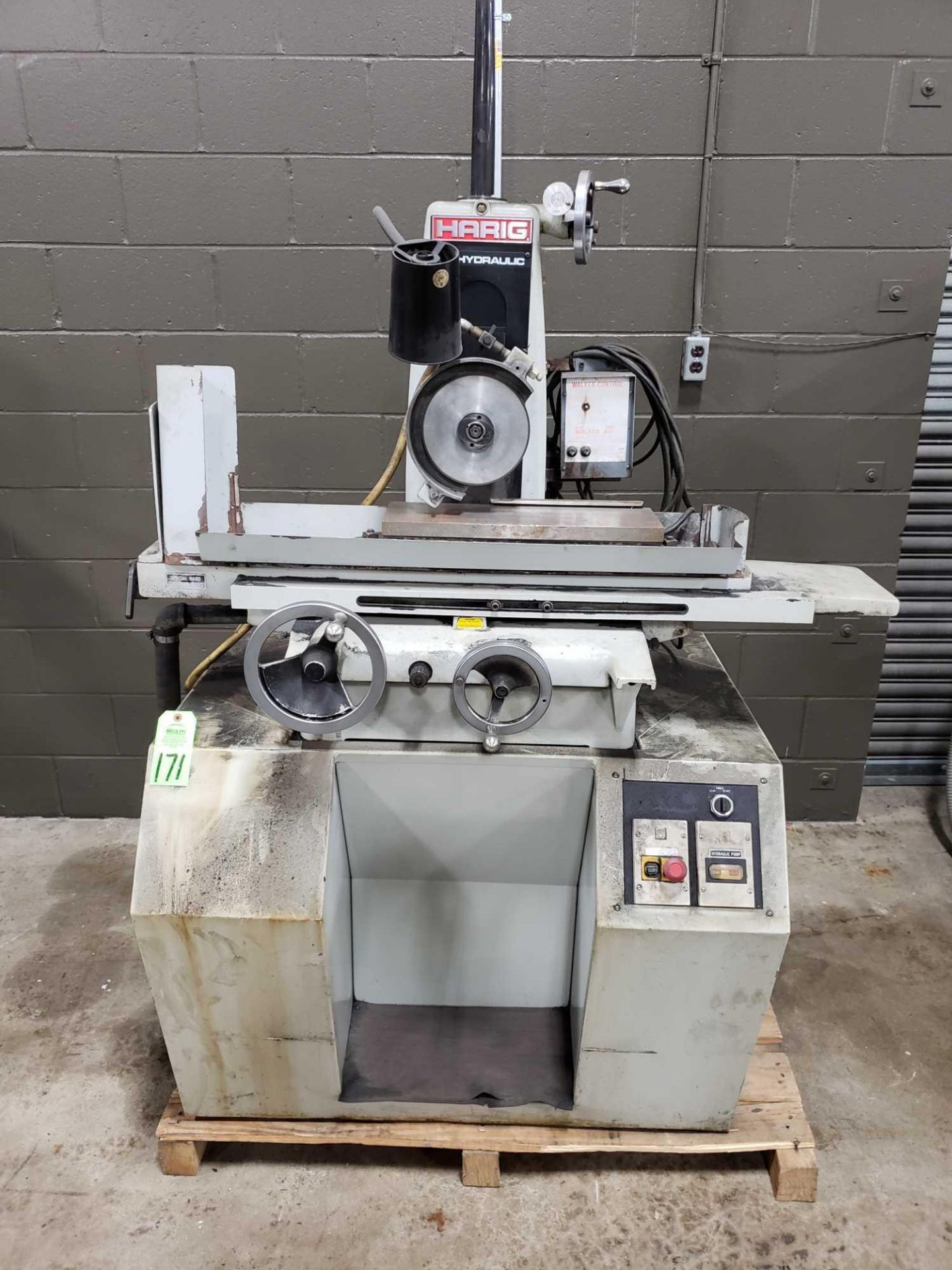 Harig 618 hydraulic surface grinder. Includes OS Walker magnetic chuck and coolant pump.