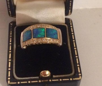 An Unmarked Gold Ladies Dress Ring, Set with three green centre stones possibly opals, surrounded by - Image 3 of 3