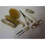A Mixed Lot of Silver Manicure and Dressing Table Items, To include a silver backed three piece