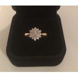 A 18ct Gold Ladies Diamond Cluster Dress Ring, ring size M1/2