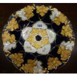 A Continental Porcelain Bowl, In the Meissen style, Decorated with gilded leaf pattern panels on a