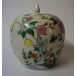 A Chinese Style "Famille Verte" Oviform Vase, With cover, Decorated with allover panels of flowers