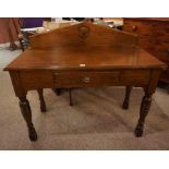 A Victorian Oak Hall Table, With a shaped pediment to the top, decorated with a plain cartouche,