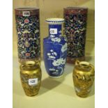 A Pair of Chinese Style Cylindrical Porcelain Vases, Decorated with allover floral panels on a